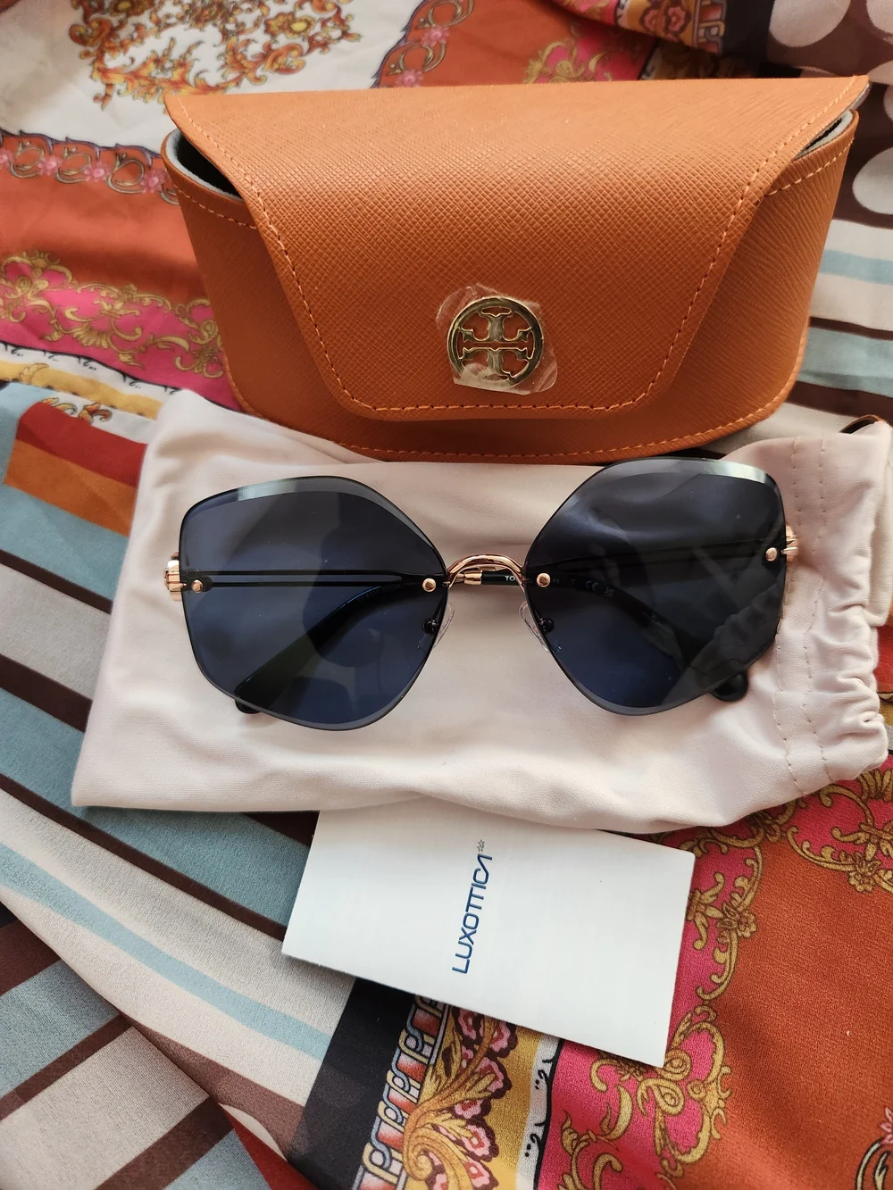 Tory Burch Women's Sunglasses with Orange Case - Blue Lenses
